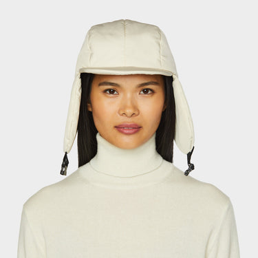 Ecru Arctic Aviator front view flaps down on model