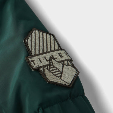 Green Kids Alpine Puffer logo close up